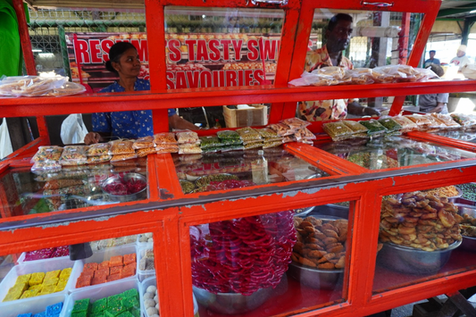 A Taste of Local Life: Colorful Indian Snacks by the Bus Stop in Fiji